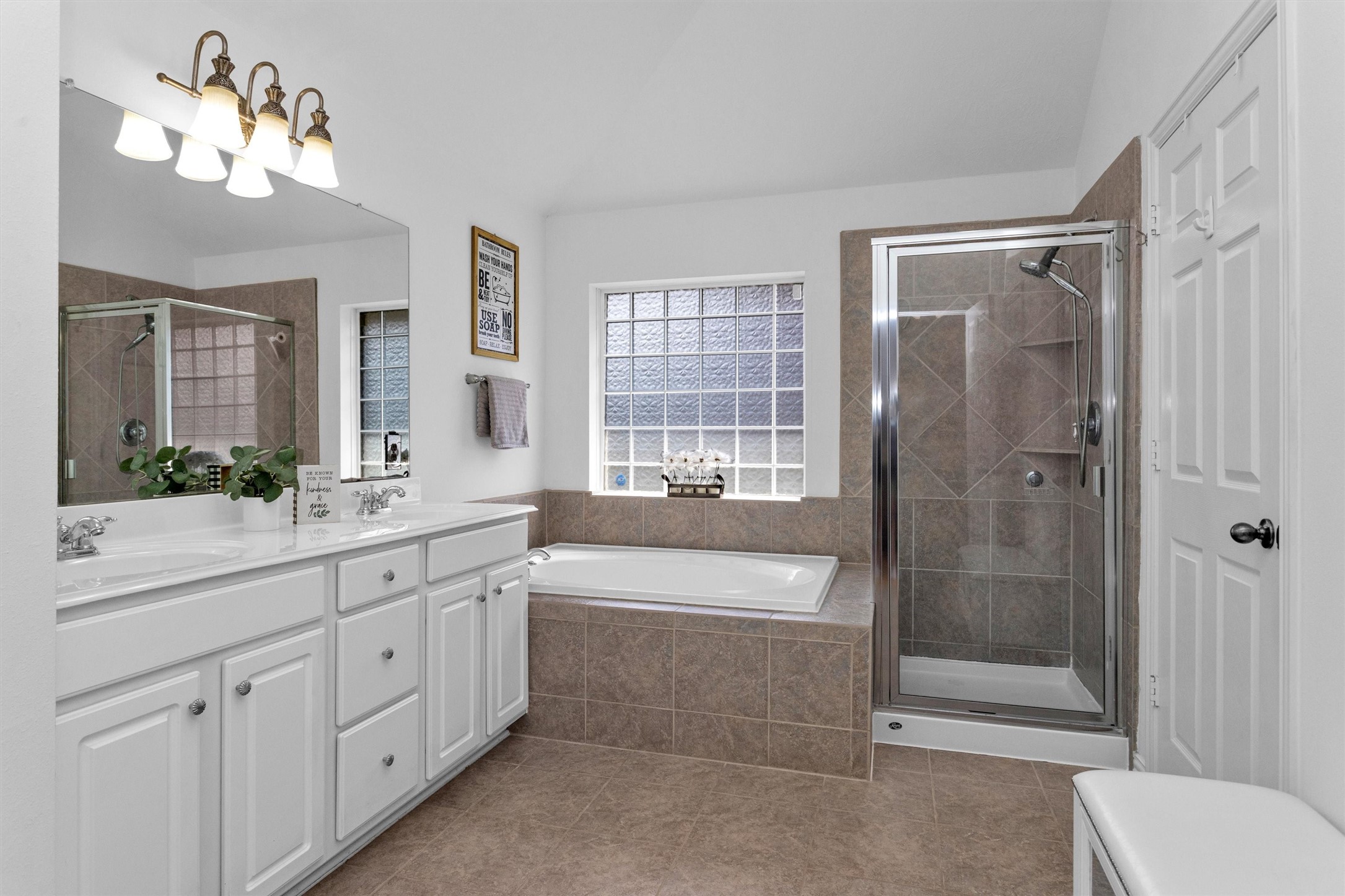 12310 West Elizabeth Shore Loop Cypress, TX 77433 - Photo 22 of 42 Primary bathroom with separate tub and shower