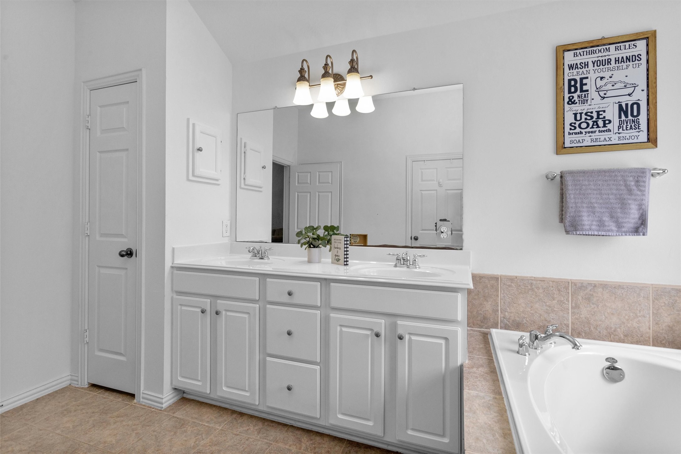 12310 West Elizabeth Shore Loop Cypress, TX 77433 - Photo 23 of 42 Double sinks in the primary bathroom