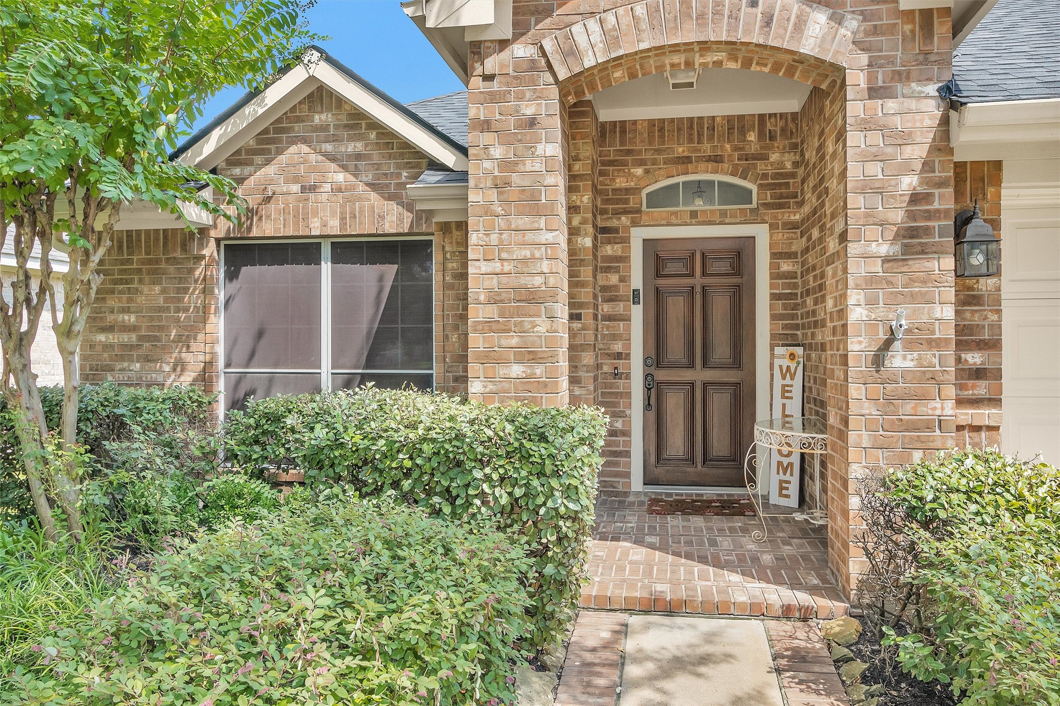 12310 West Elizabeth Shore Loop Cypress, TX 77433 - Photo 4 of 42 Covered front porch entry and solar screens.