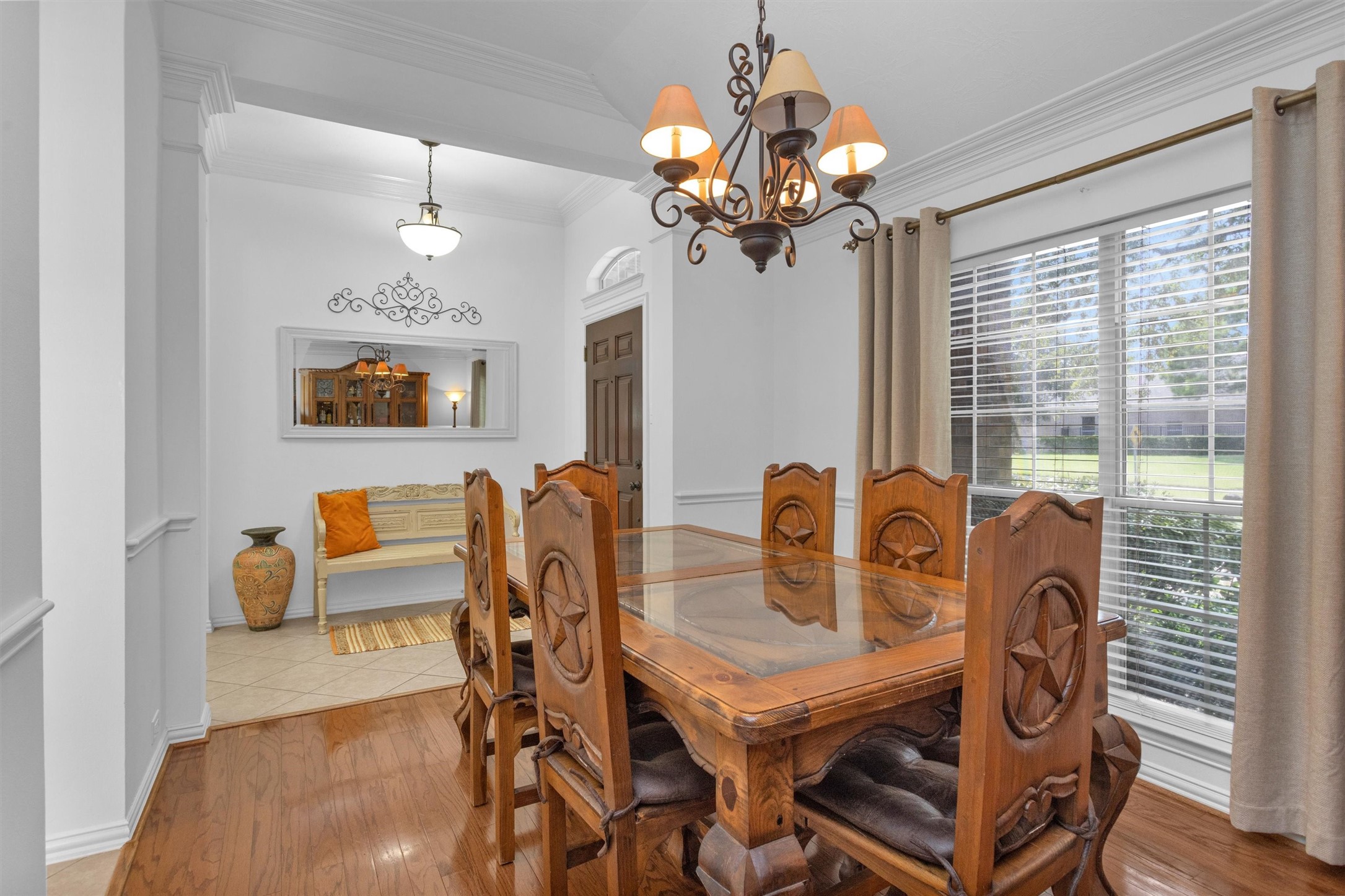 12310 West Elizabeth Shore Loop Cypress, TX 77433 - Photo 7 of 42 Off the entry hall is the formal dining room with gorgeous wood floors
