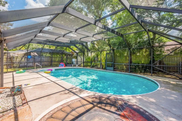 a view of a backyard with a patio