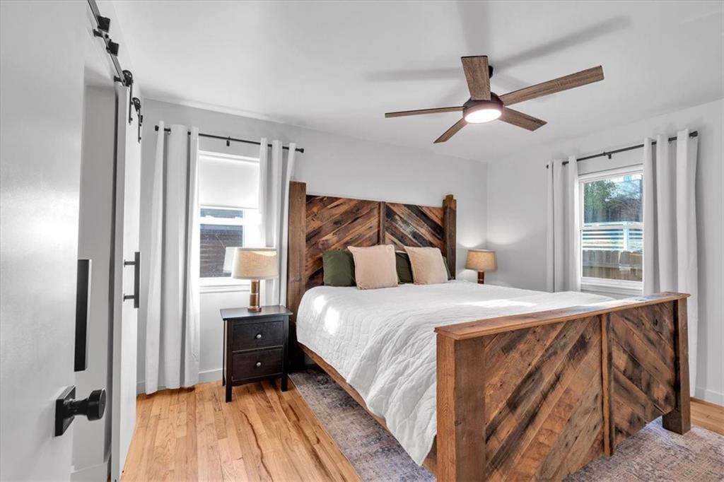 1520 Foote Street Northeast Atlanta, GA 30307 - Photo 18 of 39 a bedroom with a bed and a window