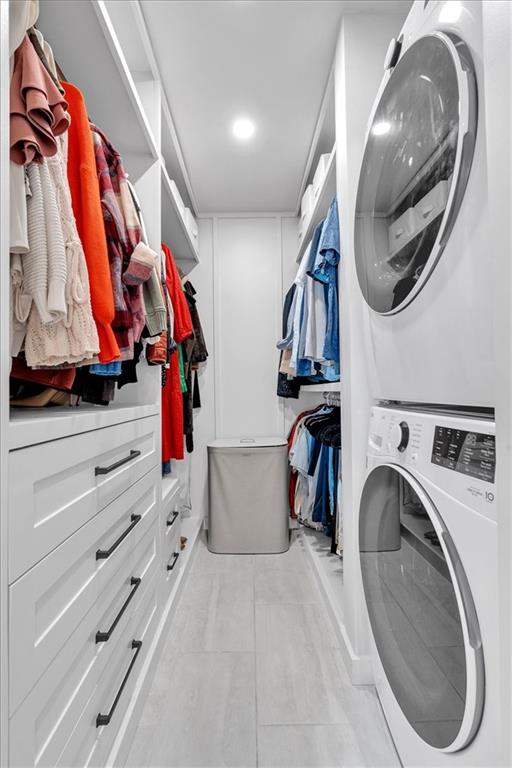 1520 Foote Street Northeast Atlanta, GA 30307 - Photo 24 of 39 a view of walk in closet with clothes and shoes