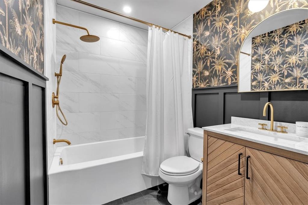 1520 Foote Street Northeast Atlanta, GA 30307 - Photo 26 of 39 a bathroom with a sink toilet and shower