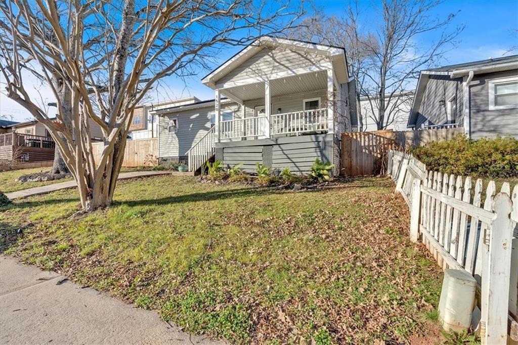 1520 Foote Street Northeast Atlanta, GA 30307 - Photo 29 of 39 a view of a house with a yard covered with snow