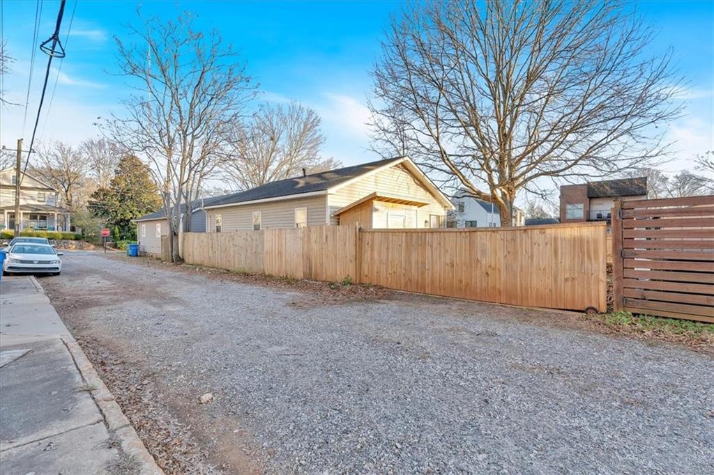 1520 Foote Street Northeast Atlanta, GA 30307 - Photo 33 of 39 a view of a backyard with a large tree