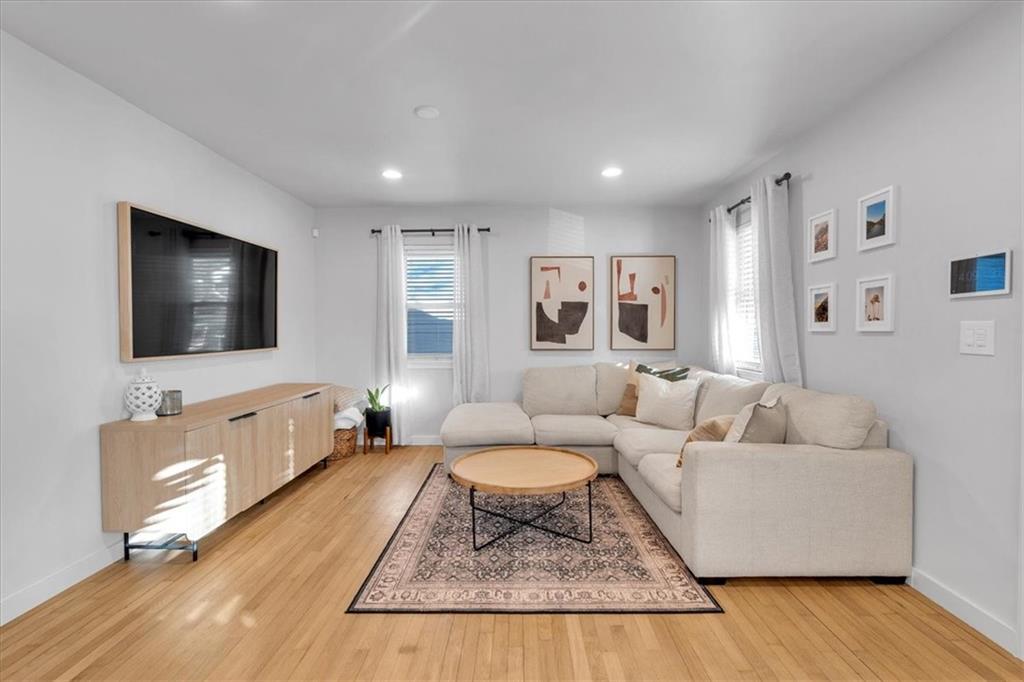 1520 Foote Street Northeast Atlanta, GA 30307 - Photo 7 of 39 a living room with furniture and a flat screen tv