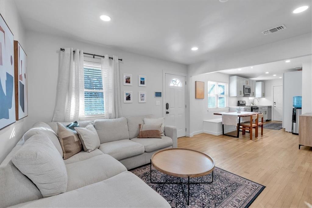 1520 Foote Street Northeast Atlanta, GA 30307 - Photo 9 of 39 a living room with furniture and a table