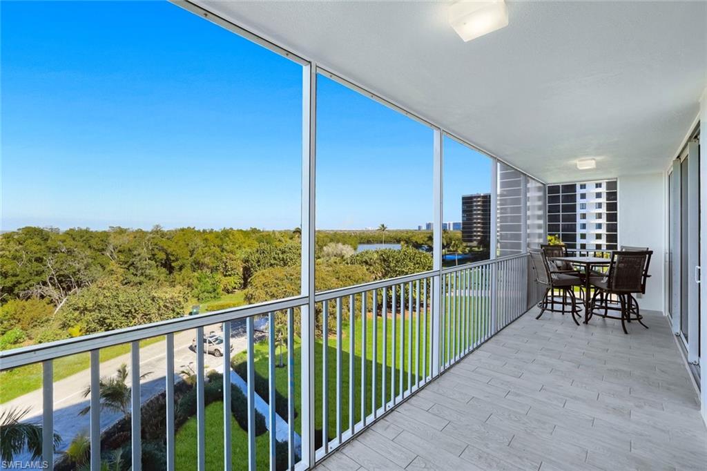 5 Bluebill Avenue, Unit 506 Naples, FL 34108 - Photo 14 of 25 a view of a city from a balcony