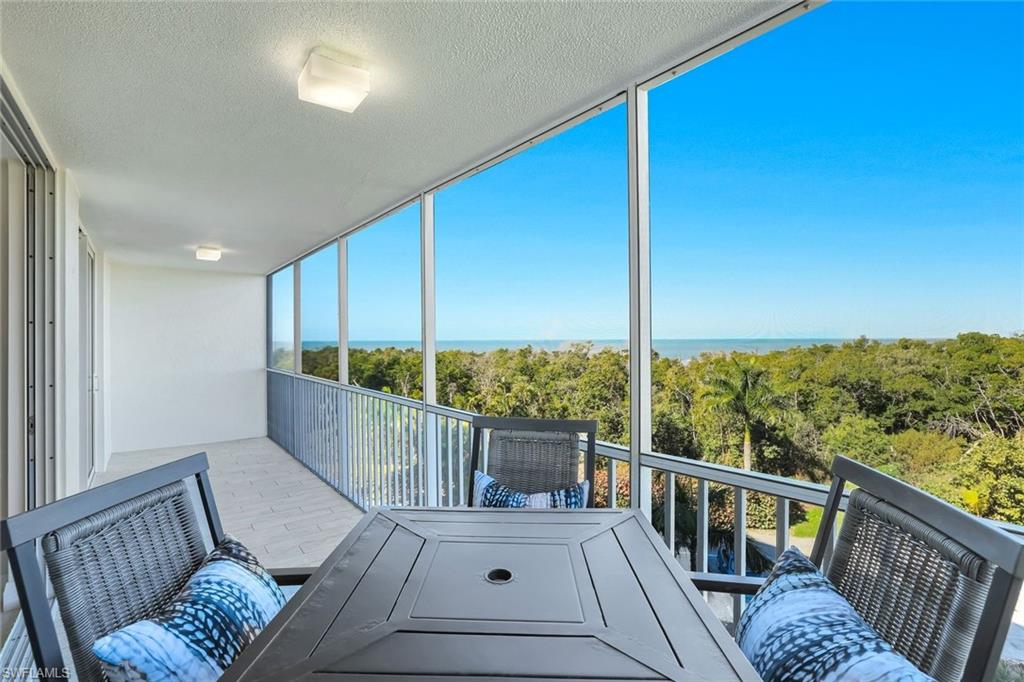 5 Bluebill Avenue, Unit 506 Naples, FL 34108 - Photo 15 of 25 a view of a balcony with couches