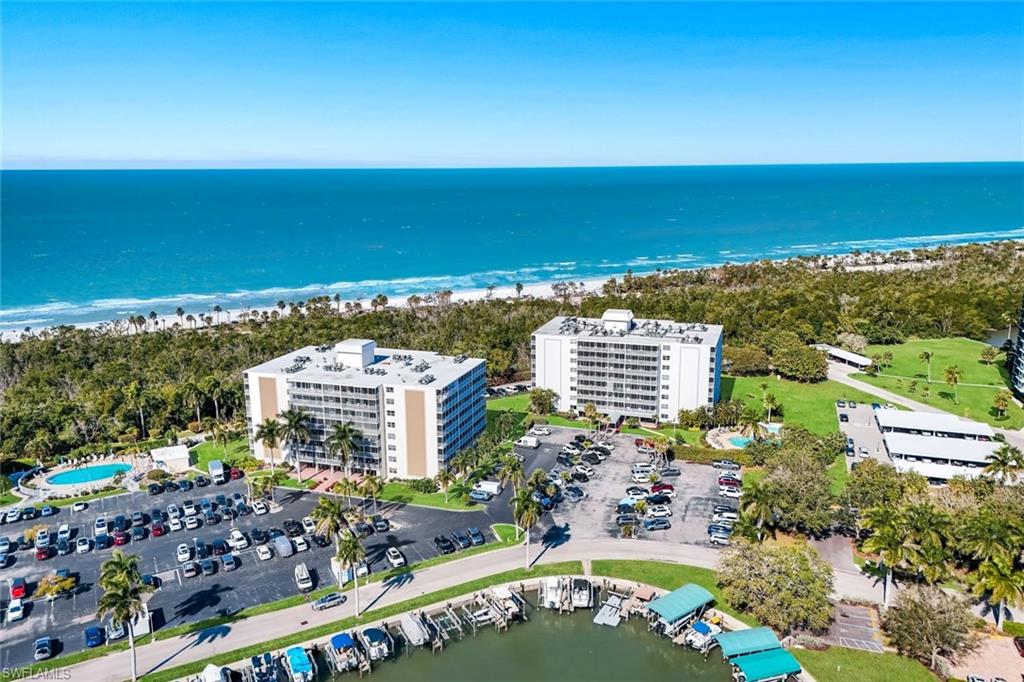 5 Bluebill Avenue, Unit 506 Naples, FL 34108 - Photo 25 of 25 a view of a city and ocean view