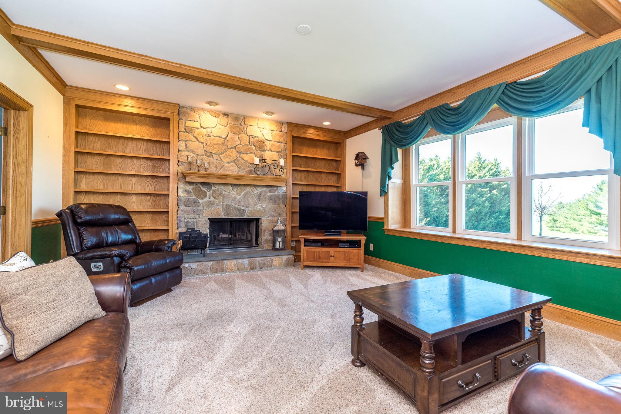 61 Lenape Road Richboro, PA 18954 - Photo 7 of 39 Family room with stone fireplace
