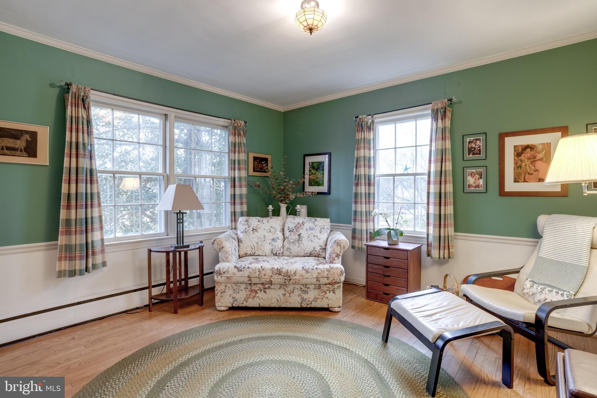 8901 Burke Road Burke, VA 22015 - Photo 28 of 63 a living room with furniture and a window