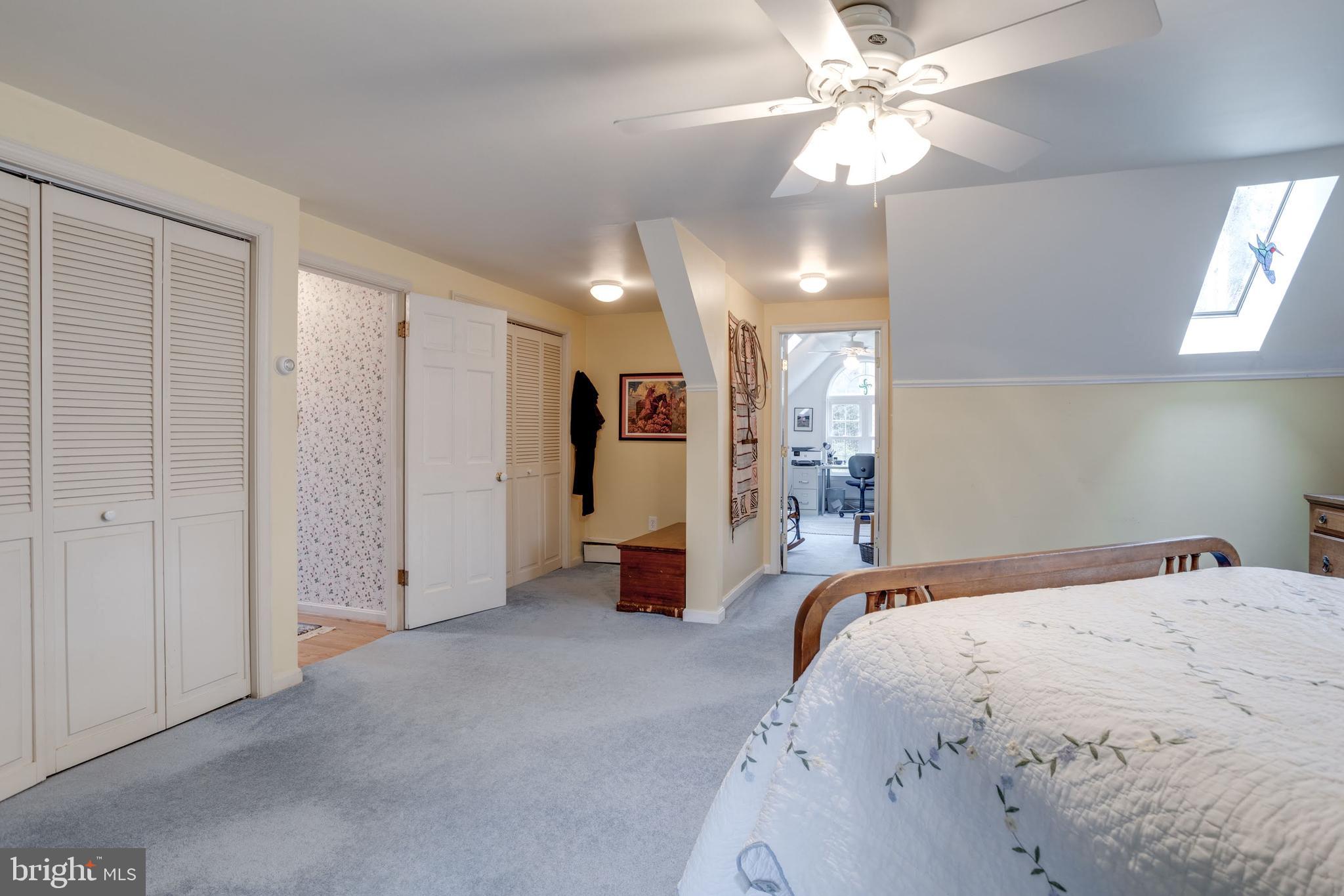8901 Burke Road Burke, VA 22015 - Photo 38 of 63 a bed room with a bed and a ceiling fan