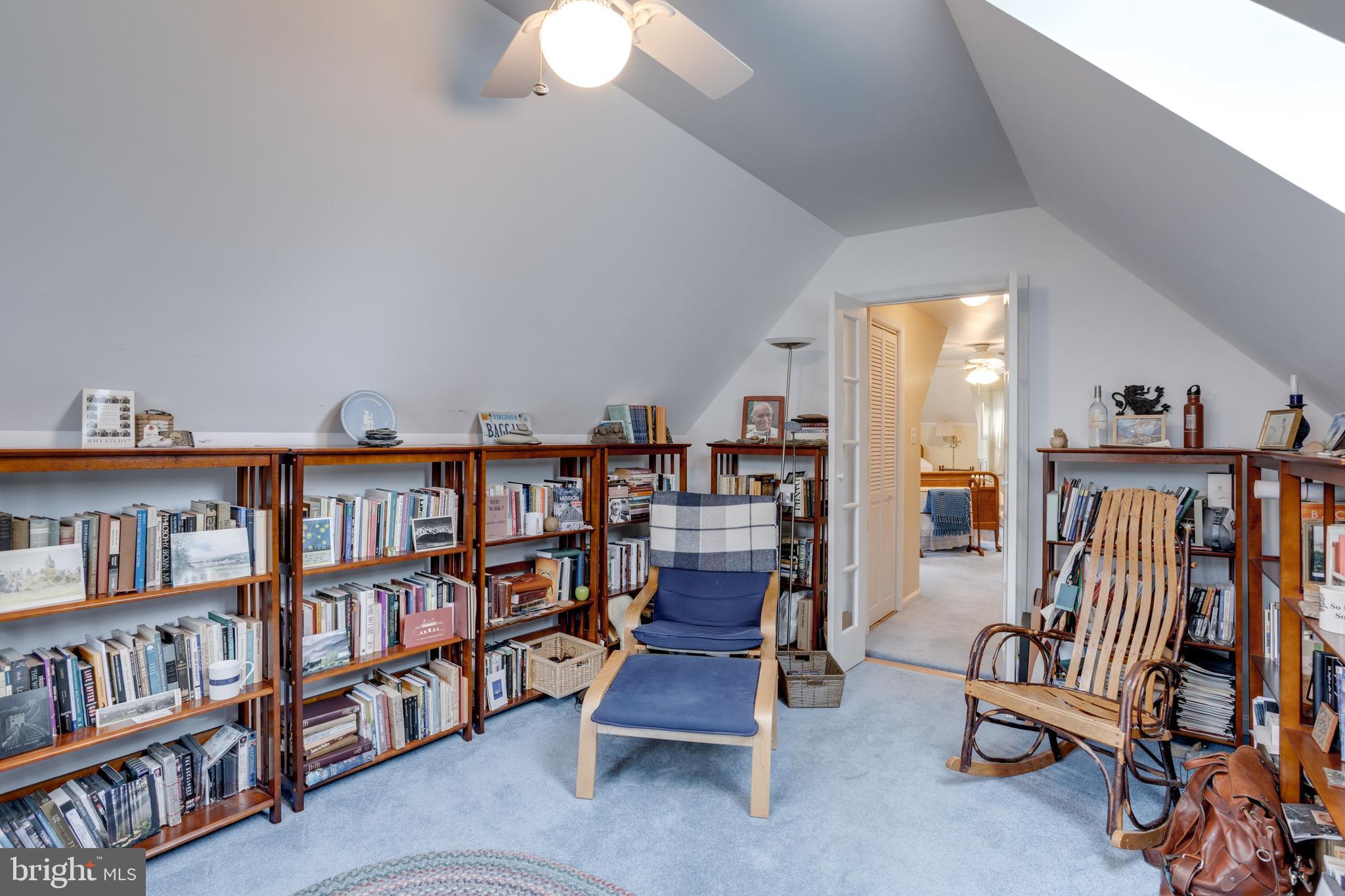 8901 Burke Road Burke, VA 22015 - Photo 40 of 63 a view of a livingroom with furniture and staircase