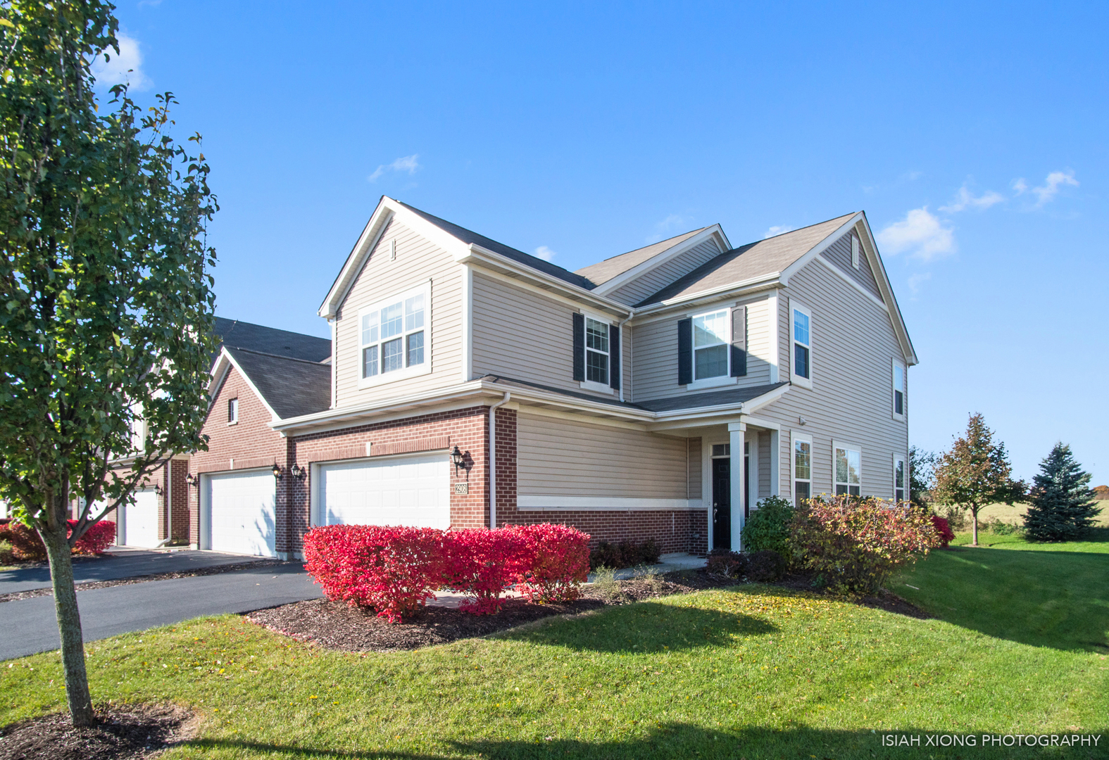 2908 Church Road Aurora, IL 60502 - Photo 2 of 26 a front view of a house with a yard