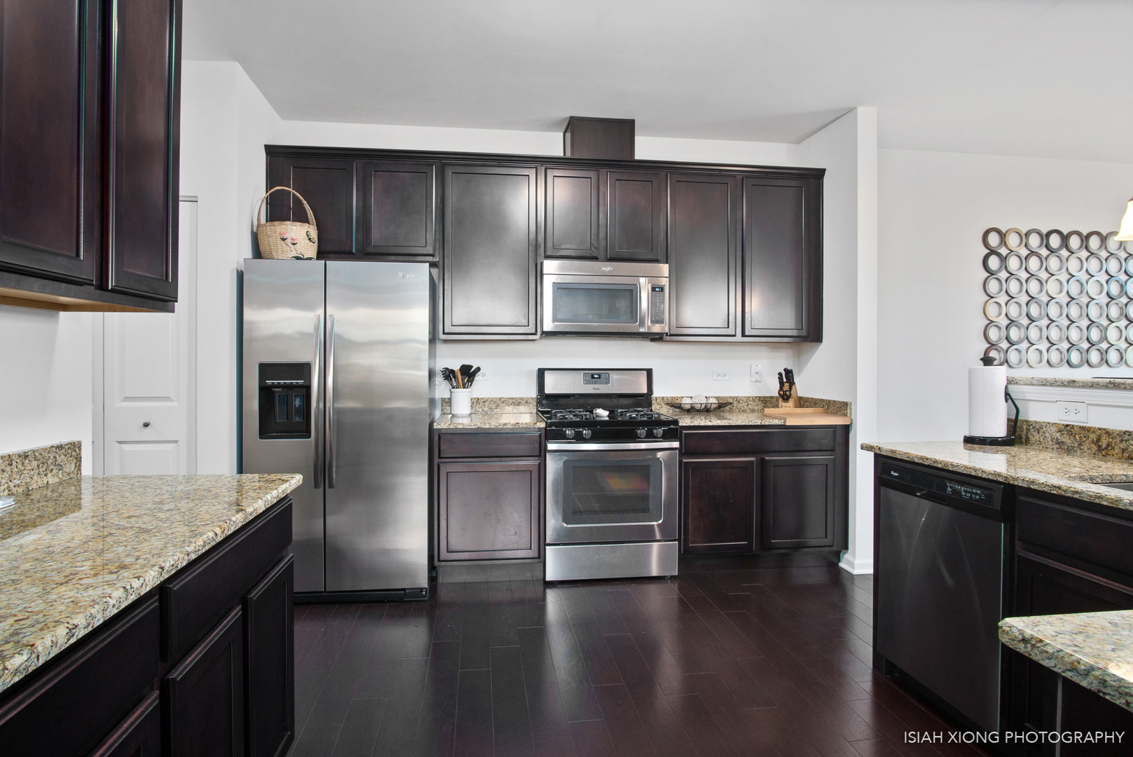 2908 Church Road Aurora, IL 60502 - Photo 12 of 26 a kitchen with granite countertop stainless steel appliances and wooden cabinets