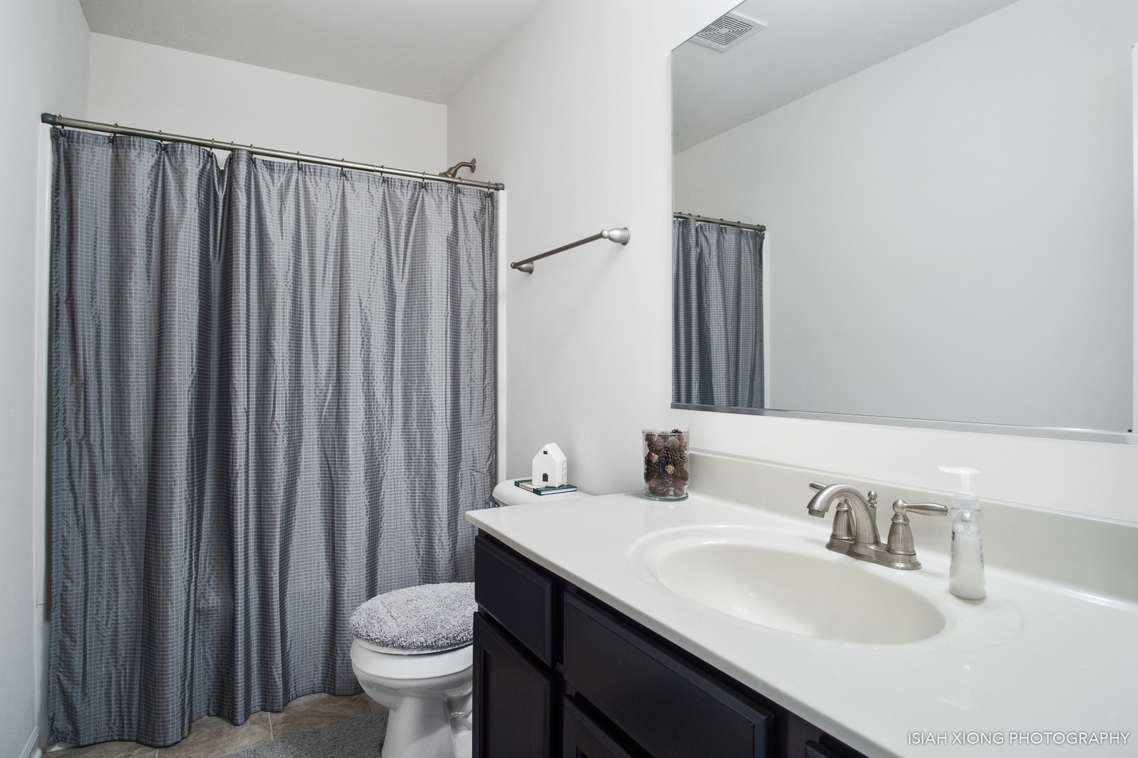 2908 Church Road Aurora, IL 60502 - Photo 20 of 26 a bathroom with a sink and a toilet