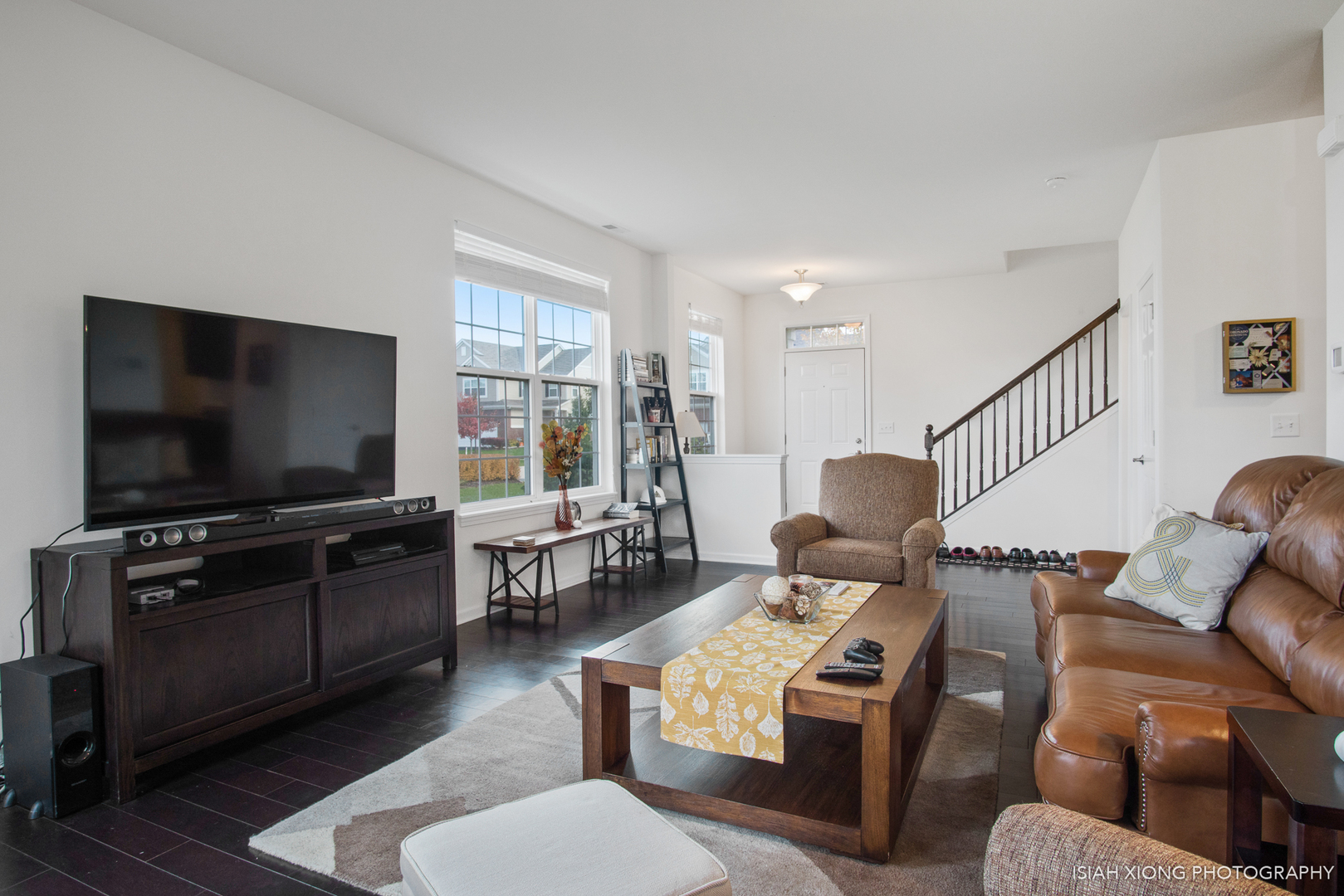 2908 Church Road Aurora, IL 60502 - Photo 7 of 26 a living room with furniture and a flat screen tv