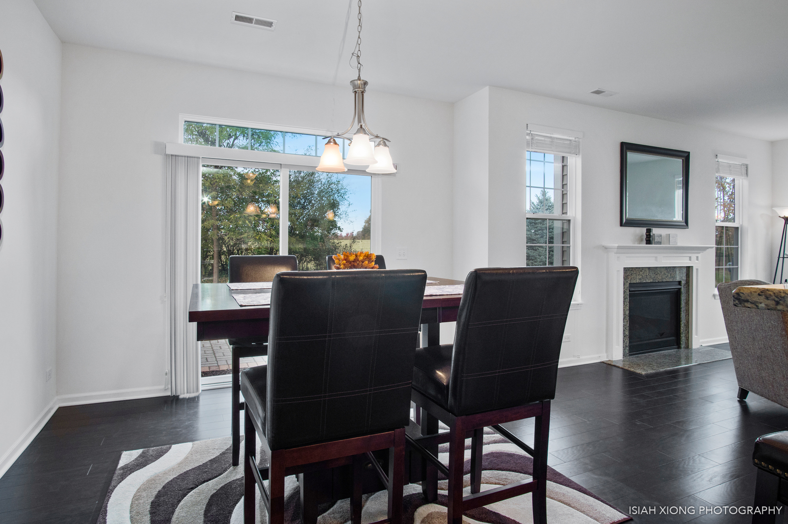 2908 Church Road Aurora, IL 60502 - Photo 9 of 26 a view of a dining room with furniture window and wooden floor