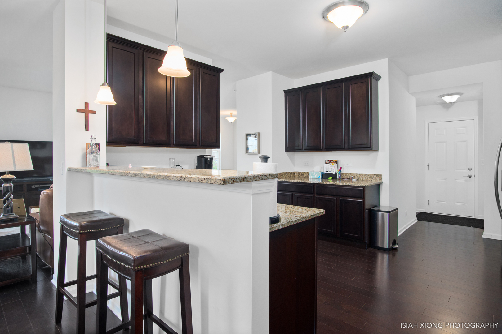 2908 Church Road Aurora, IL 60502 - Photo 10 of 26 a kitchen with a sink cabinets and wooden floor