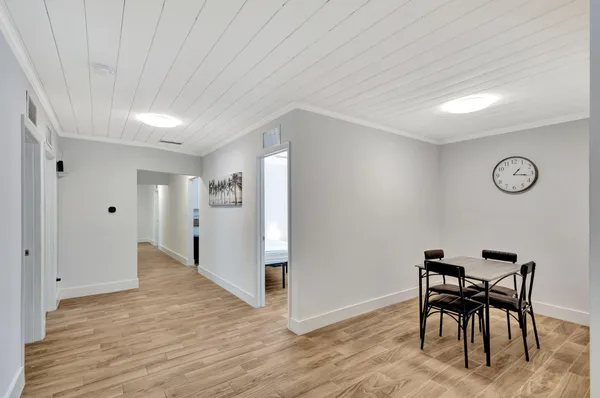 a view of livingroom with furniture and wooden floor