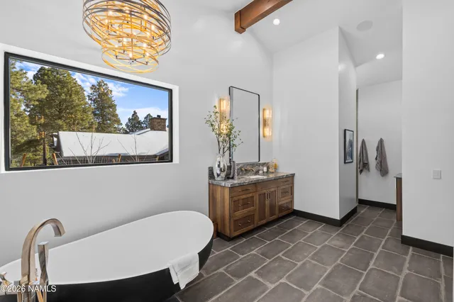 a view of kitchen with furniture and large window