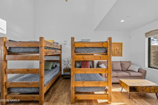 a bedroom with furniture and a bed