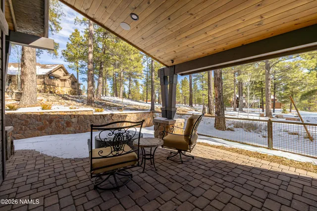 a outdoor space with chairs and sitting area