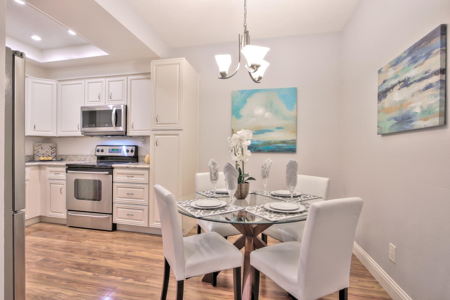 341 Shadow Run Drive San Jose, CA 95110 - Photo 13 of 25 a view of kitchen with cabinets table and chairs