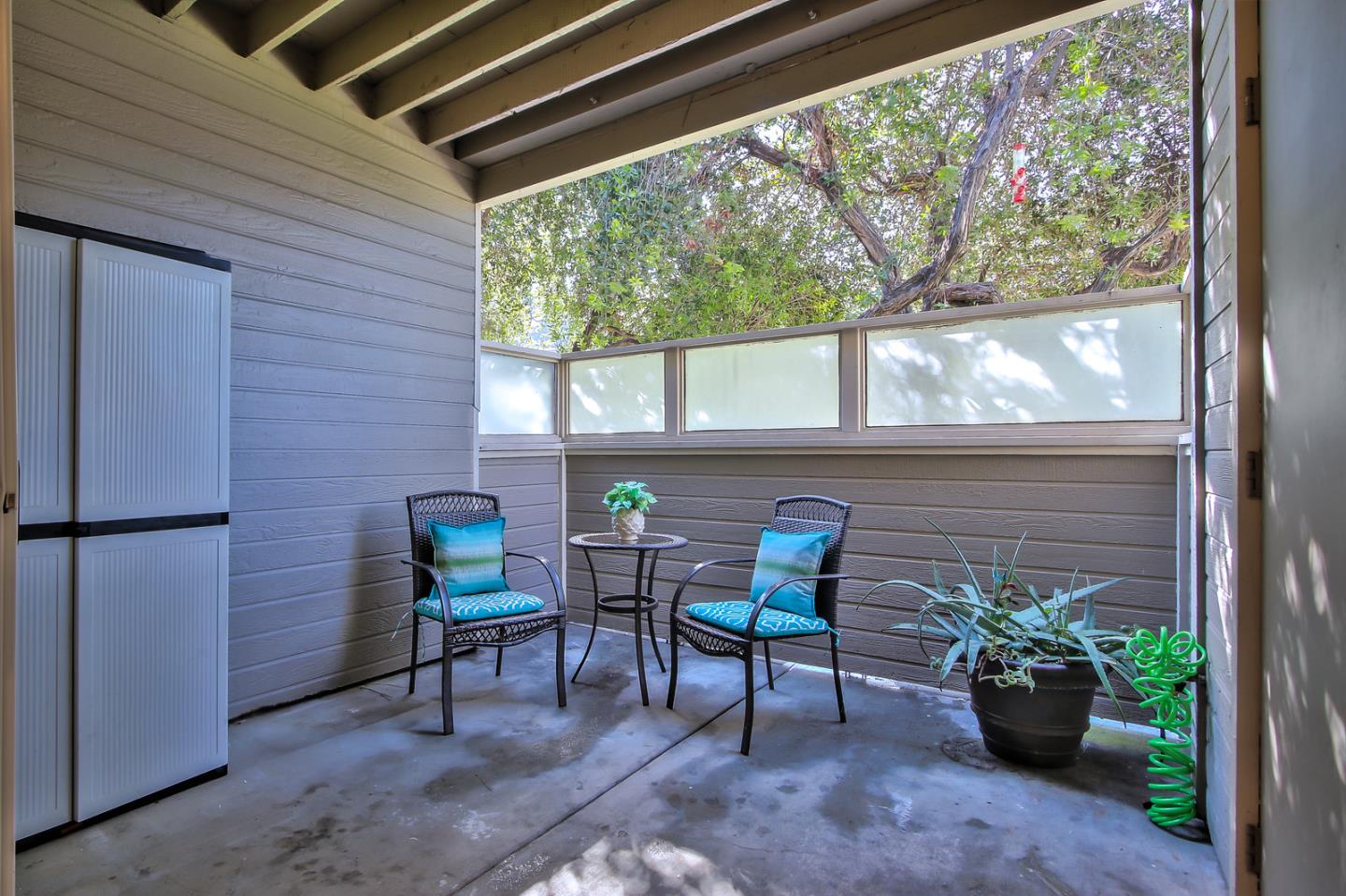 341 Shadow Run Drive San Jose, CA 95110 - Photo 22 of 25 a view of a porch with furniture and a potted plant