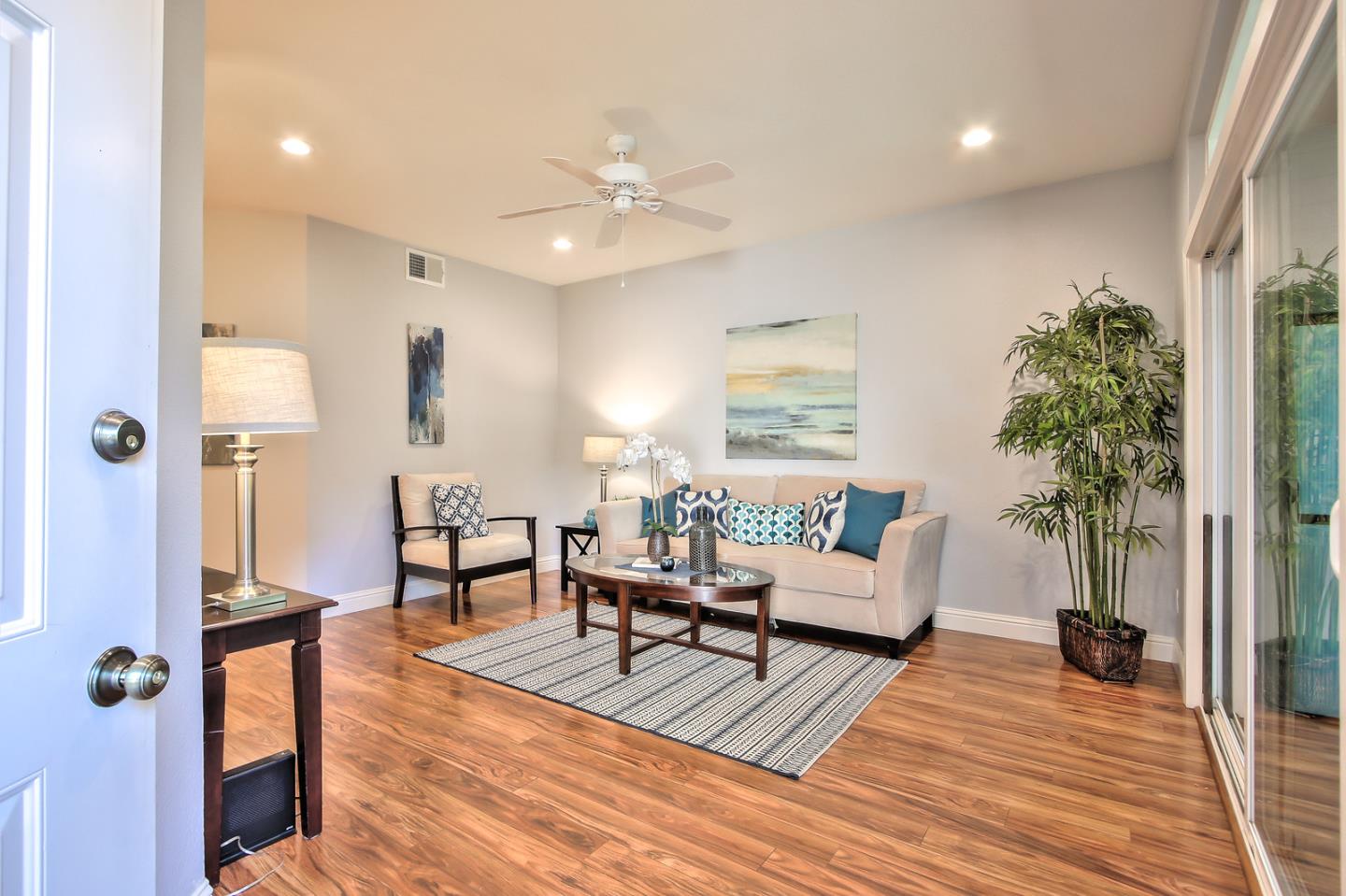 341 Shadow Run Drive San Jose, CA 95110 - Photo 6 of 25 a living room with furniture and a wooden floor