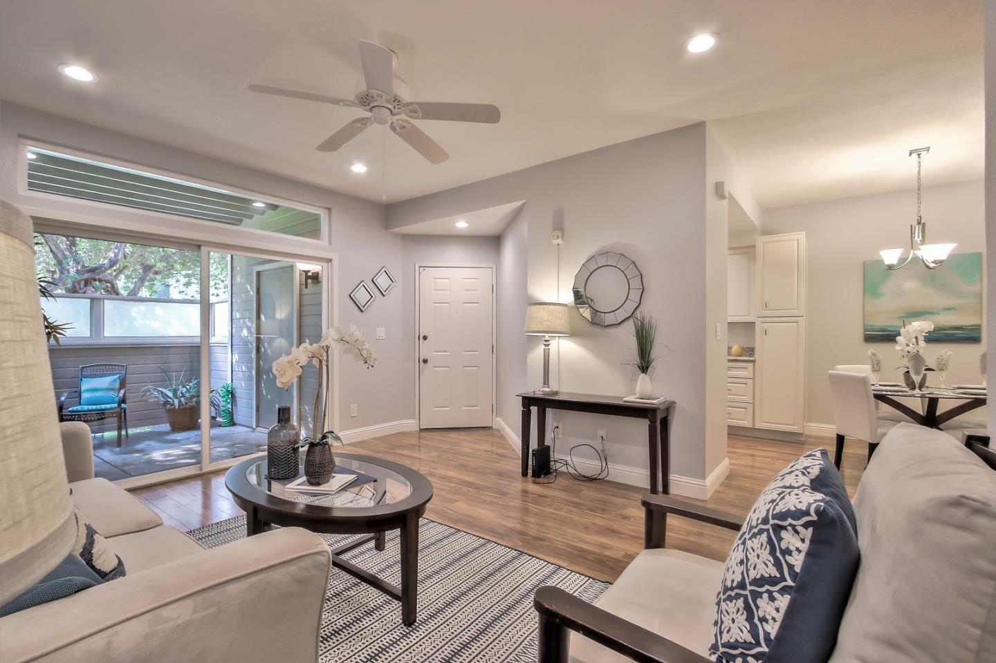 341 Shadow Run Drive San Jose, CA 95110 - Photo 9 of 25 a living room with furniture and a large window