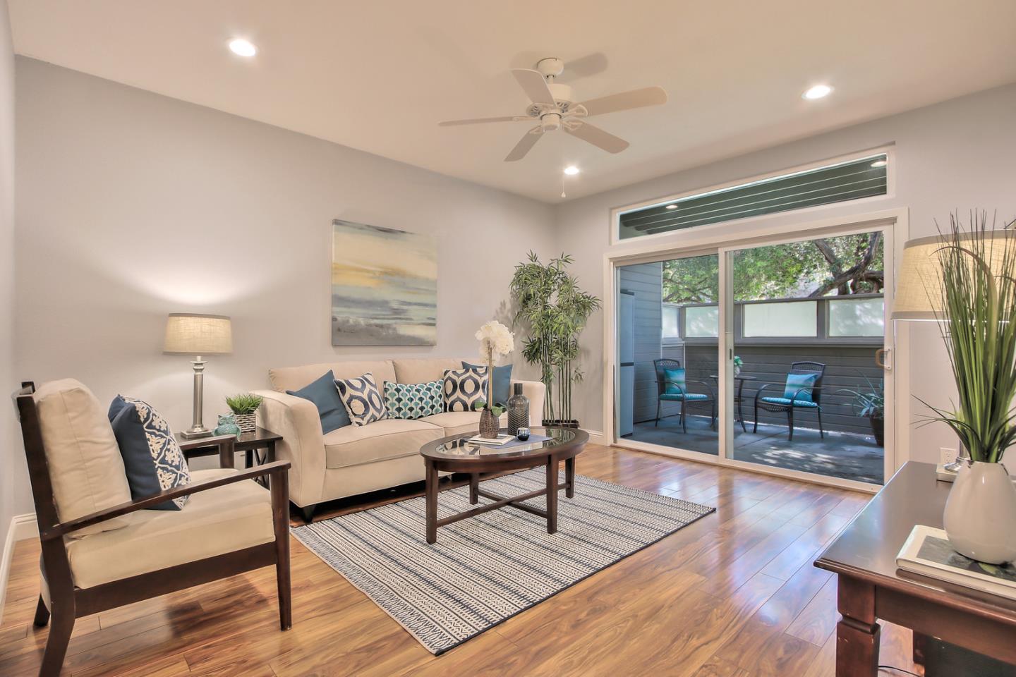 341 Shadow Run Drive San Jose, CA 95110 - Photo 10 of 25 a living room with furniture and a large window