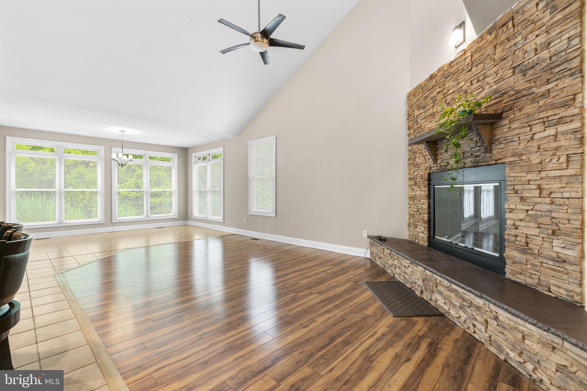 8024 Solley Road Glen Burnie, MD 21060 - Photo 24 of 83 a view of empty room with wooden floor and fan