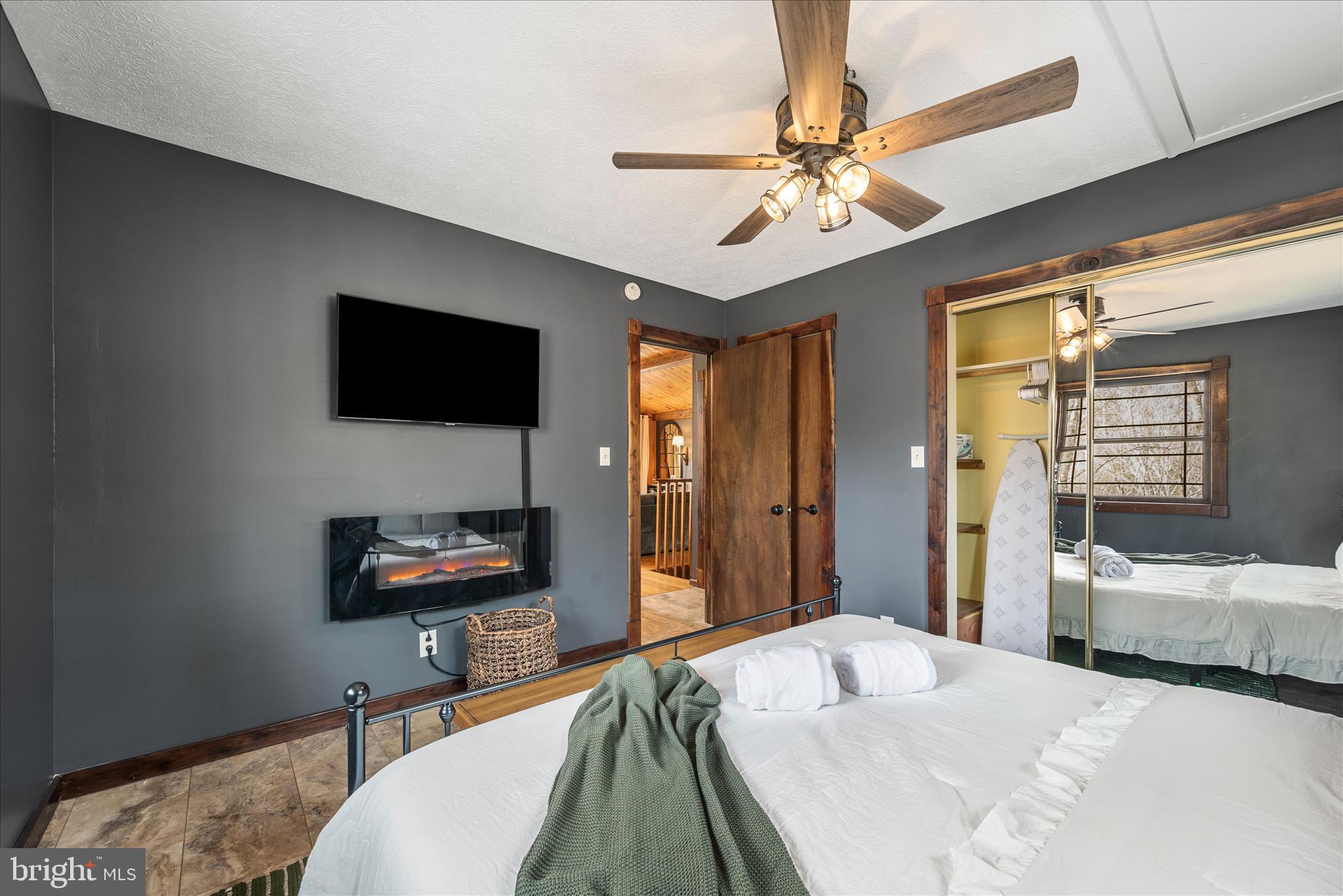 116 Palmer Road Basye, VA 22810 - Photo 11 of 30 Main level bedroom w/electric fireplace