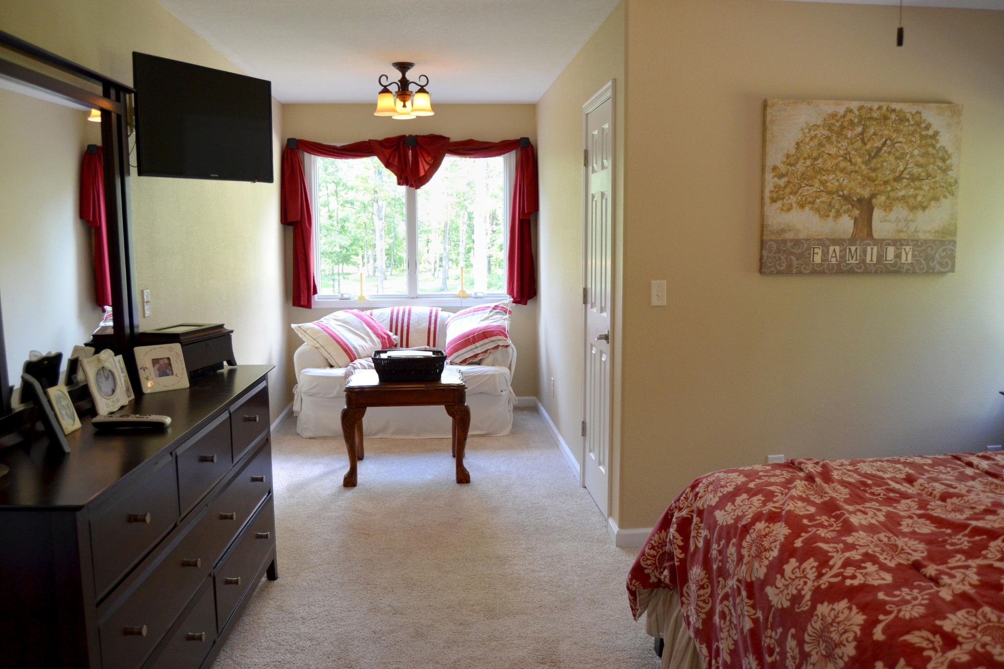 197 Rogers Road Crossville, TN 38571 - Photo 22 of 39 a bedroom with a bed and large windows