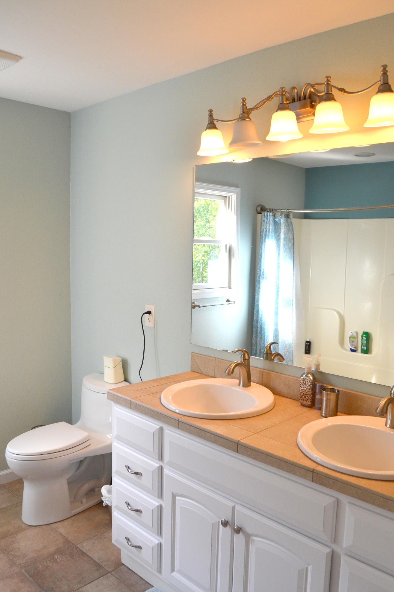 197 Rogers Road Crossville, TN 38571 - Photo 26 of 39 a bathroom with a sink and a mirror
