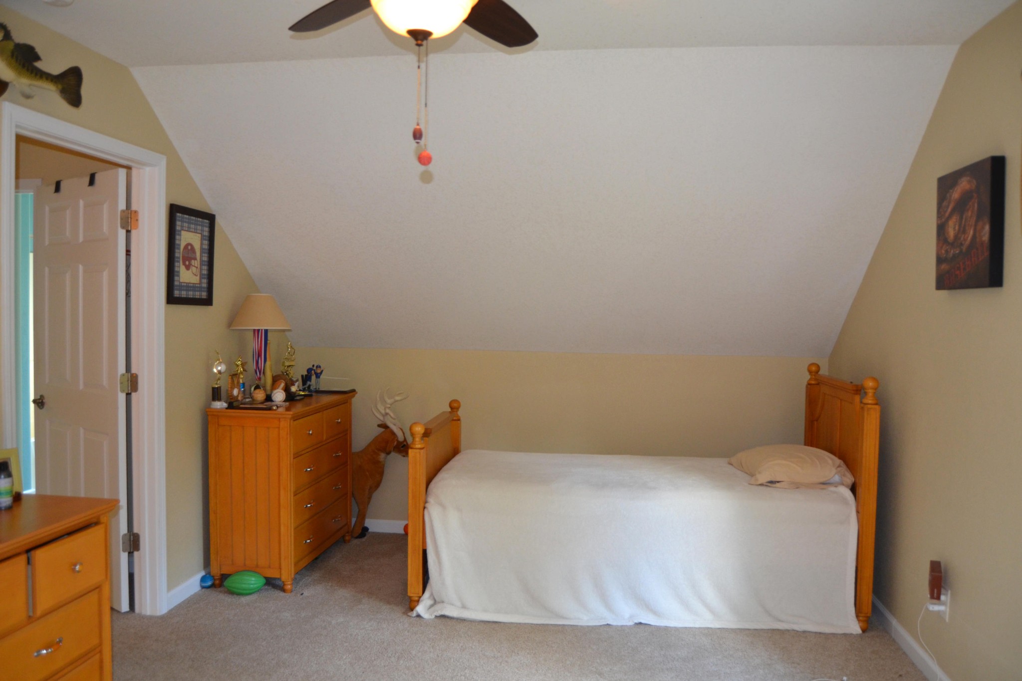 197 Rogers Road Crossville, TN 38571 - Photo 30 of 39 a bedroom with a bed and a chandelier