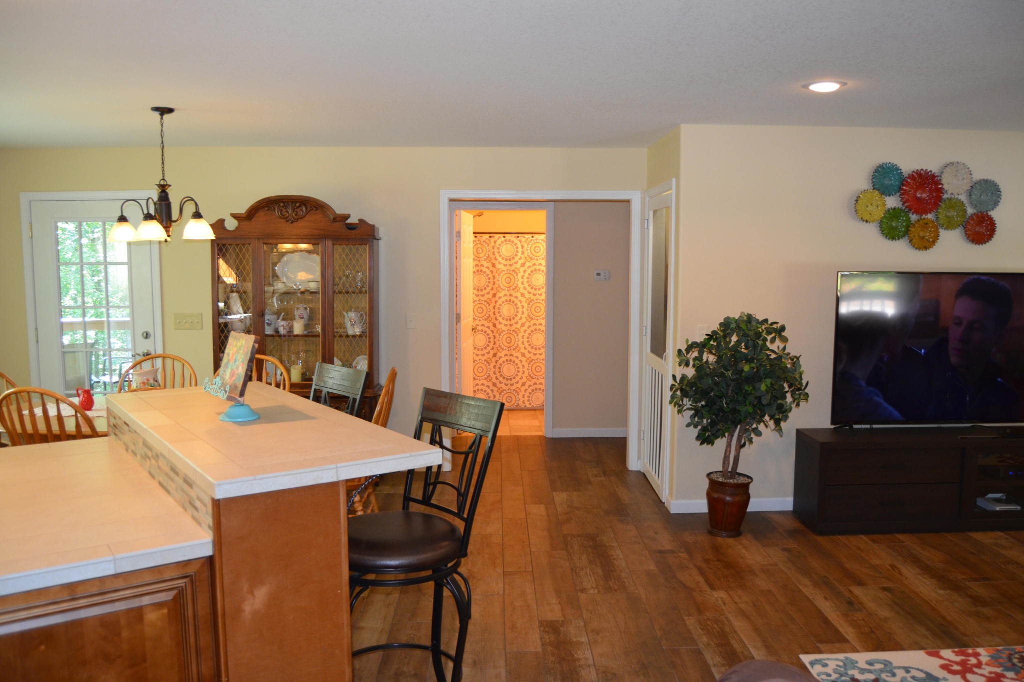 197 Rogers Road Crossville, TN 38571 - Photo 9 of 39 a view of a dining room with furniture and wooden floor