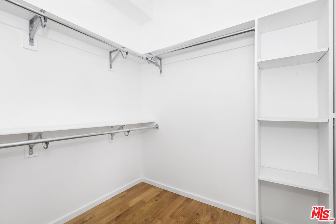 1411 West Roca Lane Los Angeles, CA 90041 - Photo 15 of 21 a view of a room with racks on the wall