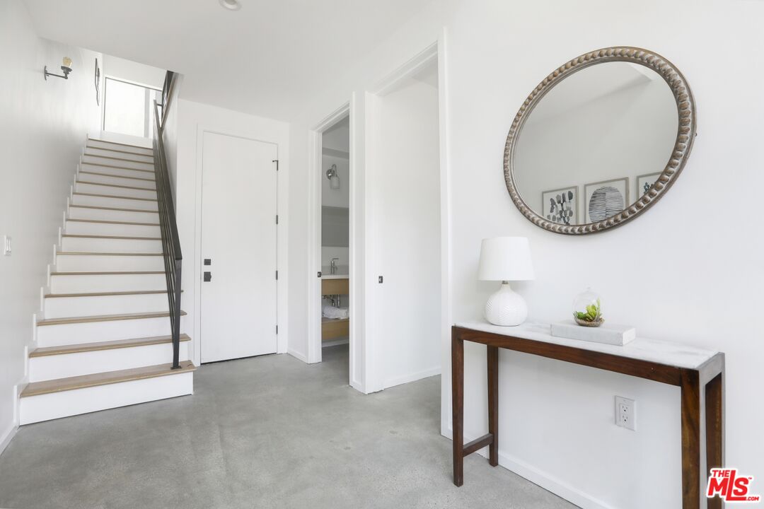1411 West Roca Lane Los Angeles, CA 90041 - Photo 17 of 21 a view of an entryway with wooden floor