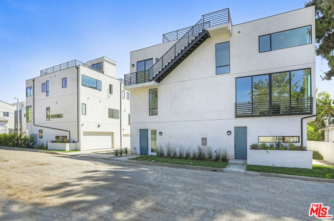 1411 West Roca Lane Los Angeles, CA 90041 - Photo 19 of 21 a front view of a house with a yard