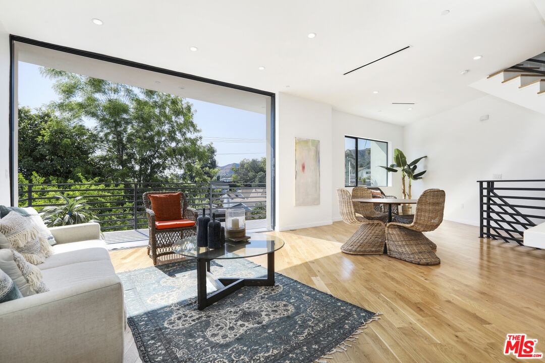 1411 West Roca Lane Los Angeles, CA 90041 - Photo 6 of 21 a living room with furniture and a large window