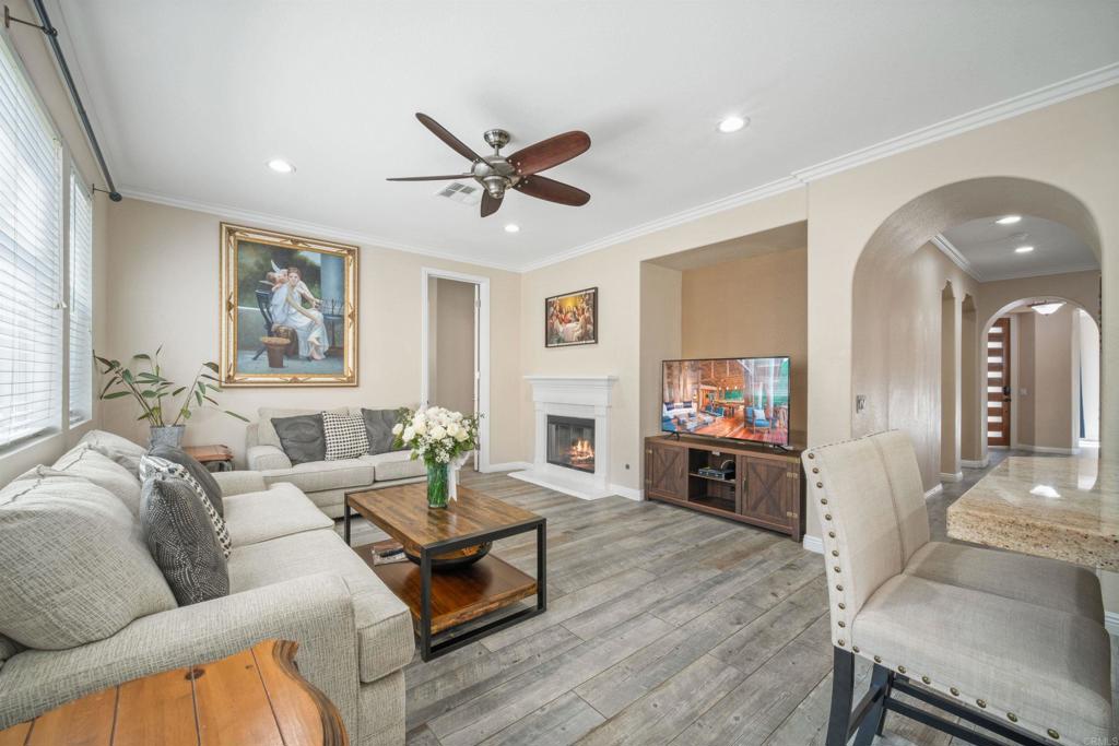 2781 Rambling Vista Road Chula Vista, CA 91915 - Photo 16 of 50 a living room with furniture and a wooden floor