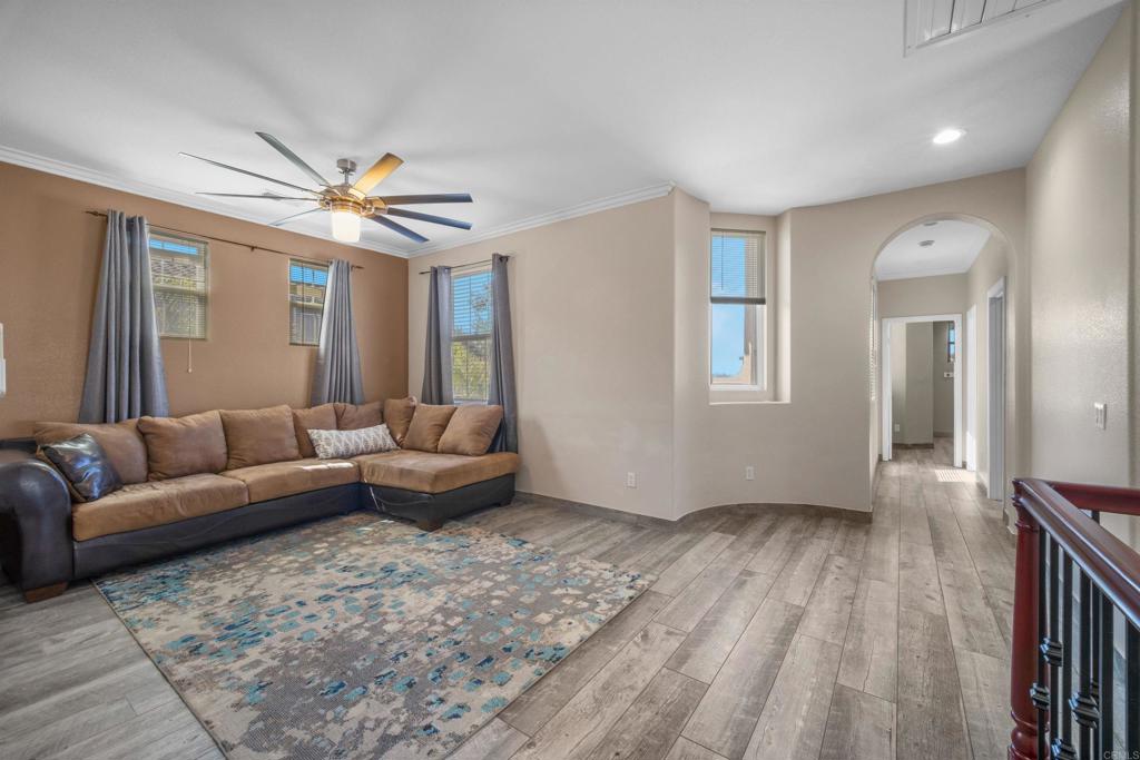 2781 Rambling Vista Road Chula Vista, CA 91915 - Photo 38 of 50 a living room with furniture and a large window