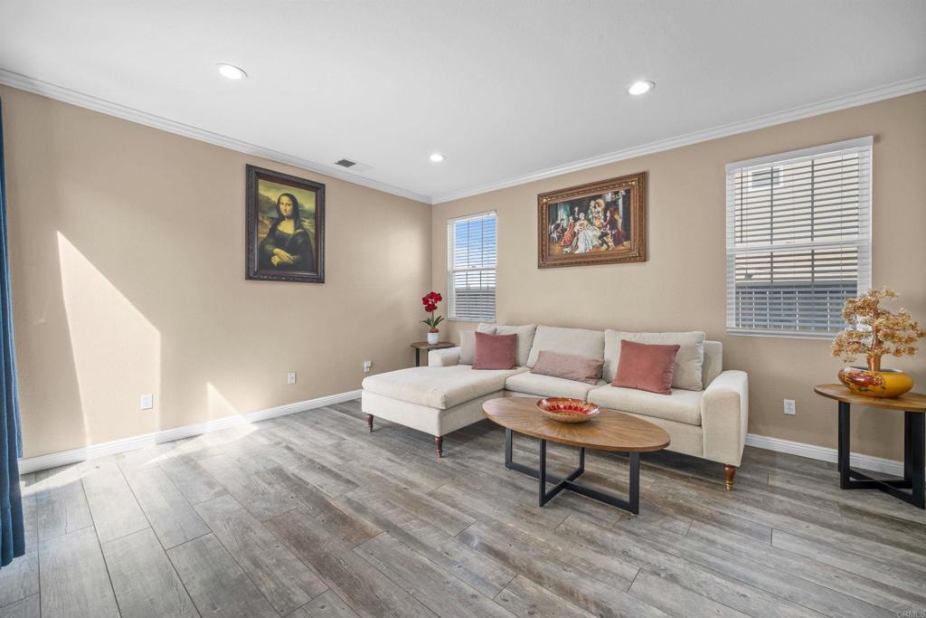 2781 Rambling Vista Road Chula Vista, CA 91915 - Photo 5 of 50 a living room with furniture and a wooden floor