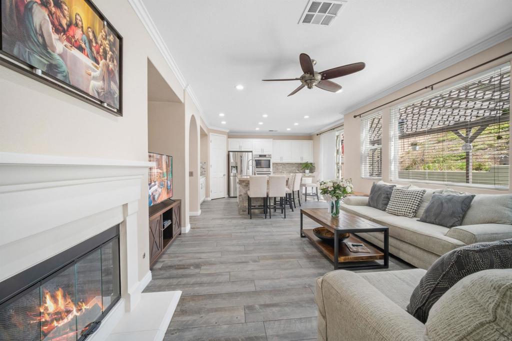 2781 Rambling Vista Road Chula Vista, CA 91915 - Photo 7 of 50 a living room with furniture and a fireplace