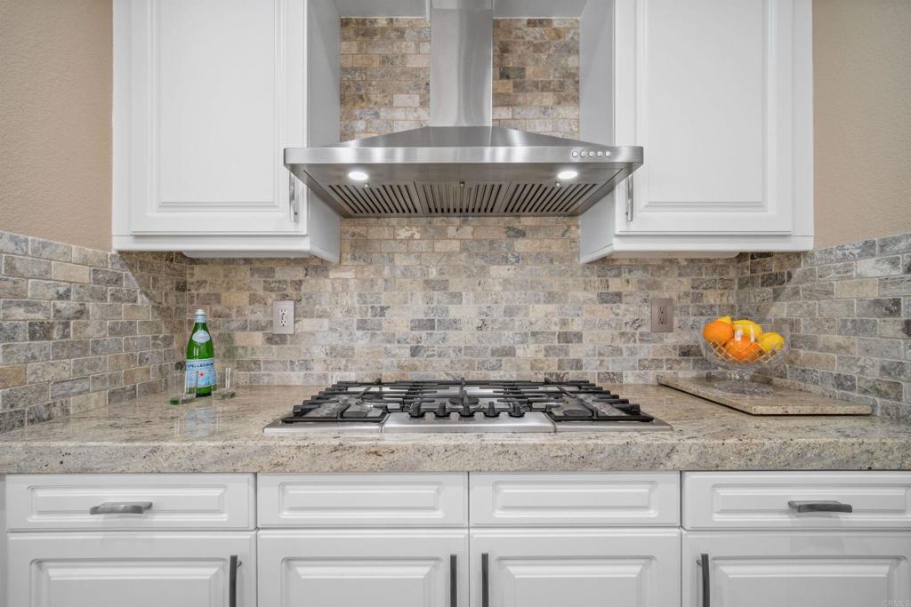 2781 Rambling Vista Road Chula Vista, CA 91915 - Photo 9 of 50 a kitchen with stove and cabinets