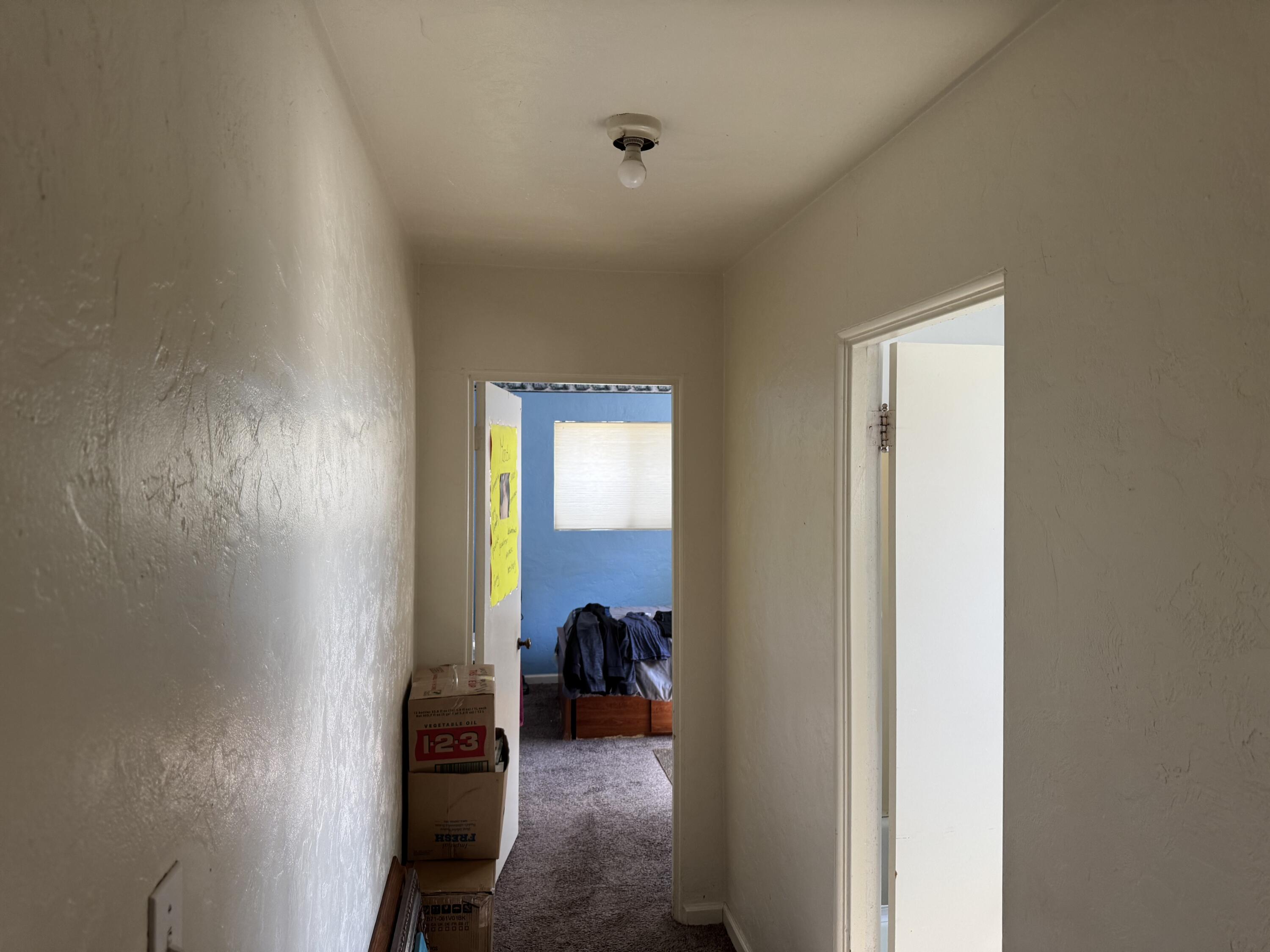 1015 Gold Street Redding, CA 96001 - Photo 10 of 17 a view of a room that has a bed and a mirror